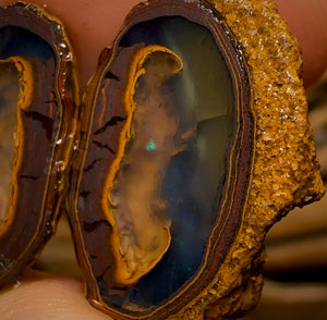 28.1cts - Yowah Nut Crystal Centre Rough Pair with Suspended Black Crystal Fire Highlights