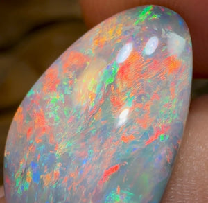 8.4cts - Lightning Ridge Semi Black Opal. Red Fire - Opal Whisperers