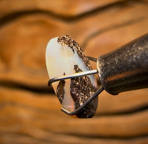 1.7cts - “Passing through the clouds” Queensland Boulder Seam Opal