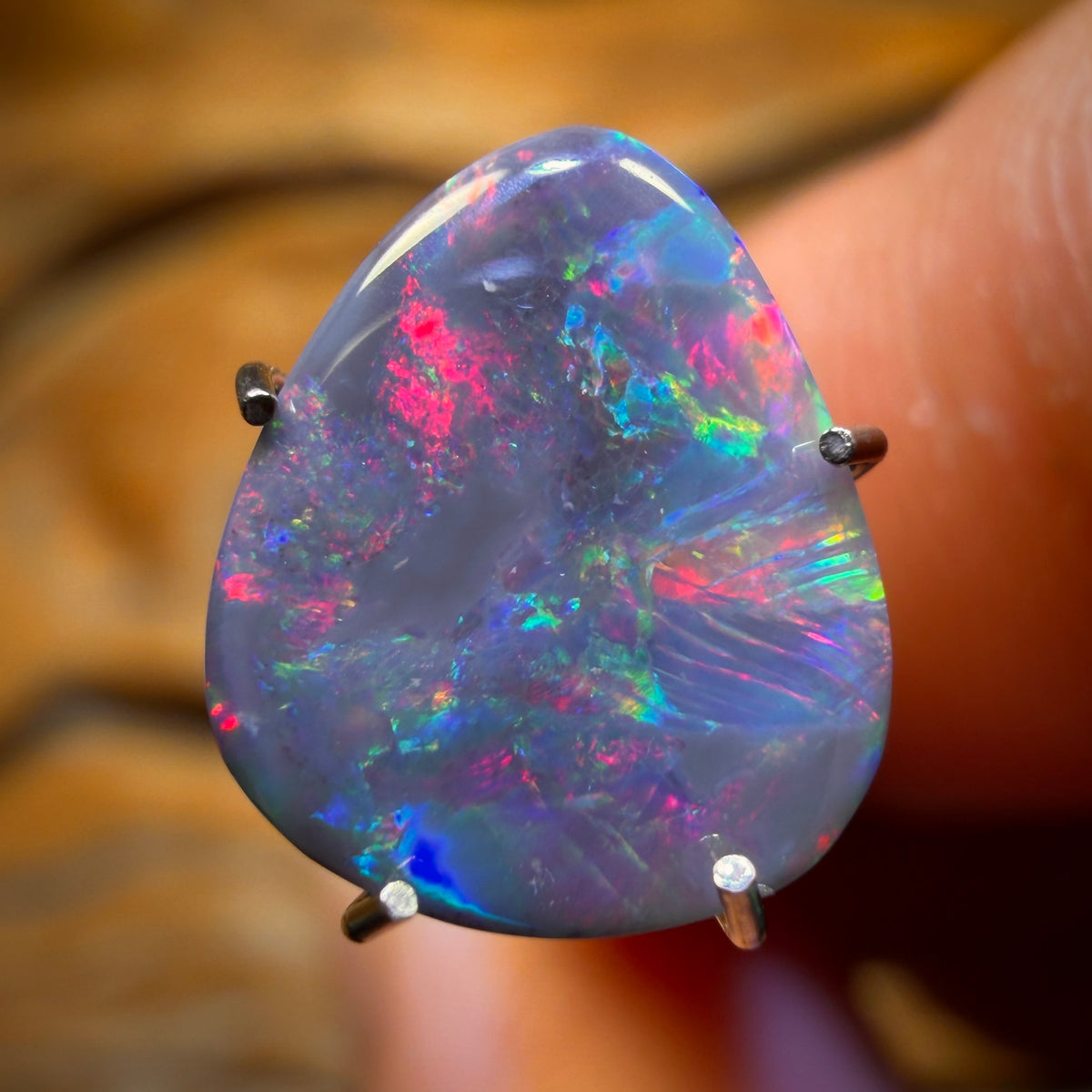 1.2cts - Black Opal from Lightning Ridge. RED ON BLACK