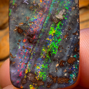 Bargain Card! 49.3cts - “Jet Stream” Large Australian Boulder Seam Opal. Electric Red Multi
