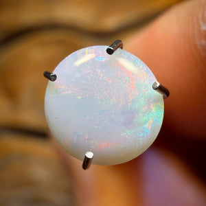 Bargain Card! 0.6cts - South Australian White Opal from Coober Pedy
