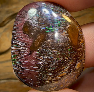 86.9cts - Australian Boulder Opal. Black Tribal Pattern