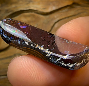 62.6cts - Australian Boulder Opal. Black Tribal Pattern red lightning