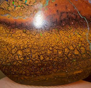 44.1cts - Australian Boulder Opal. Tan tribal landscape