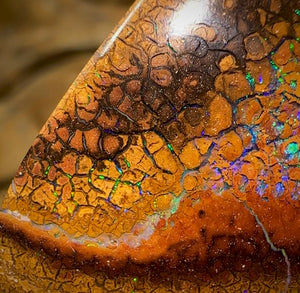 44.1cts - Australian Boulder Opal. Tan tribal landscape