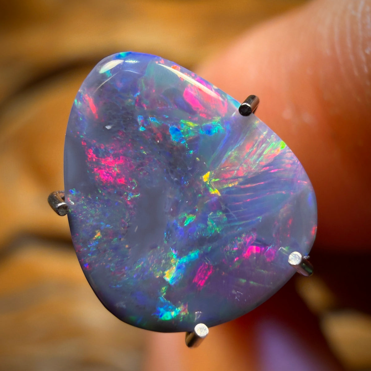 30% Off Card! 1.2cts - Black Opal from Lightning Ridge. RED ON BLACK