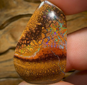 44.1cts - Australian Boulder Opal. Tan tribal landscape