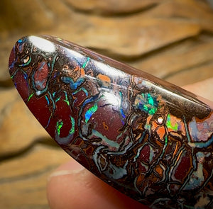 82.4cts - Australian Boulder Opal. Black Tribal Pattern