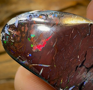 62.6cts - Australian Boulder Opal. Black Tribal Pattern red lightning