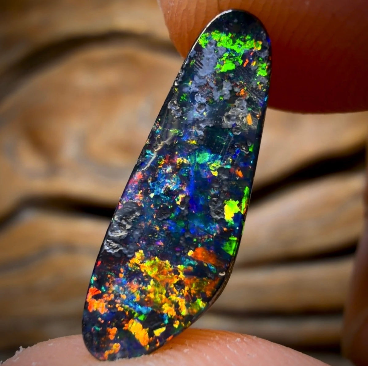 3.9cts - Banger! Queensland Boulder Black Opal. Multicolours!