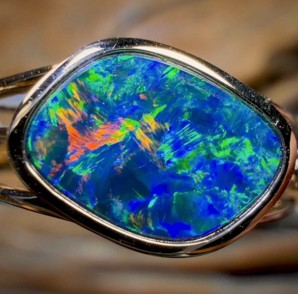 Bague double en or 14 carats et opale boulder du Queensland