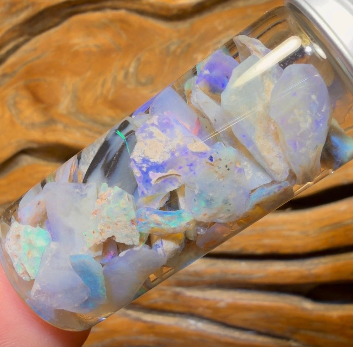 55.5cts - Rare Mintabie Rough Opal Vial. South Australian Opal