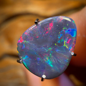 30% Off Card! 1.2cts - Black Opal from Lightning Ridge. RED ON BLACK
