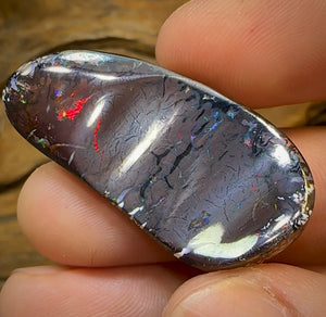 62.6cts - Australian Boulder Opal. Black Tribal Pattern red lightning