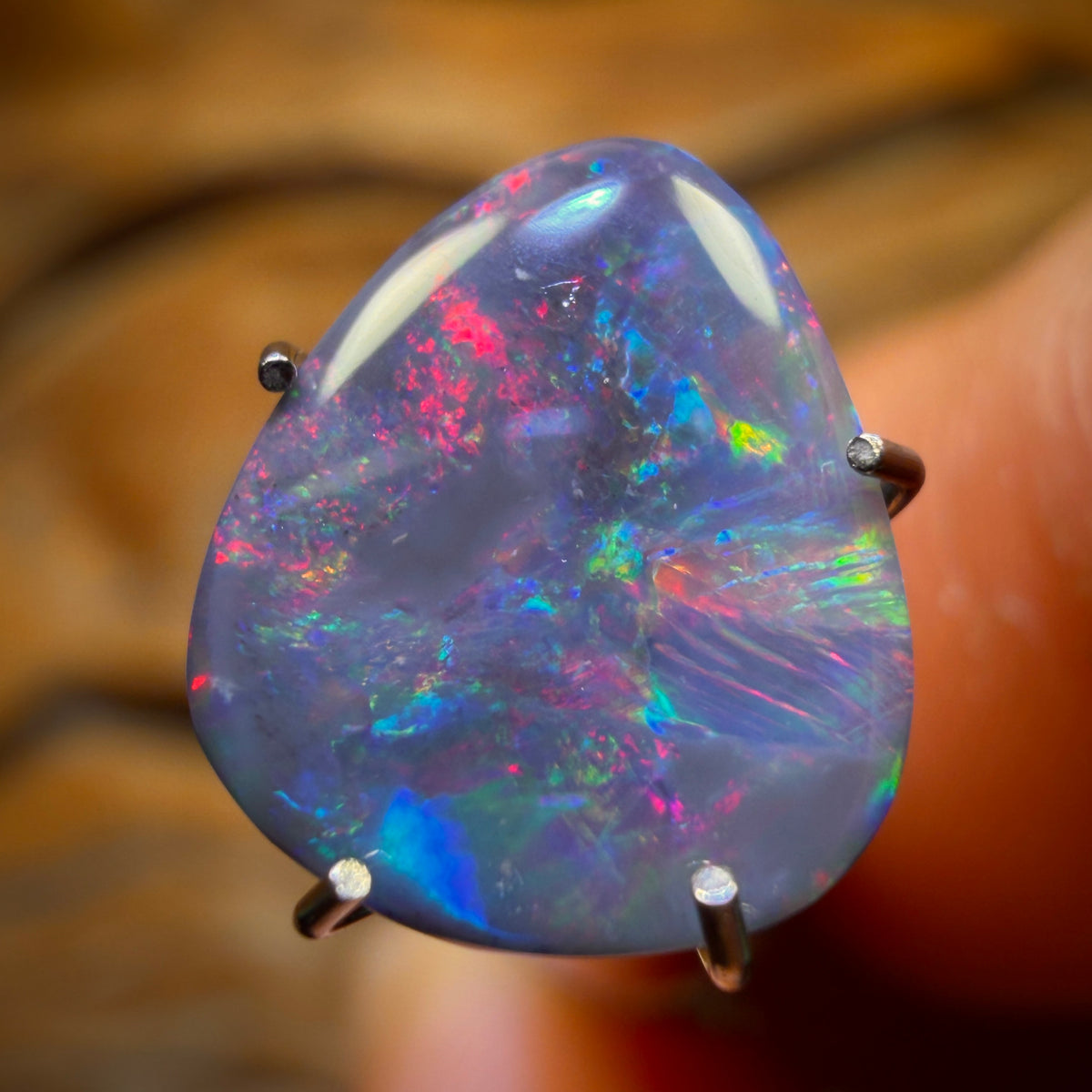 30% Off Card! 1.2cts - Black Opal from Lightning Ridge. RED ON BLACK