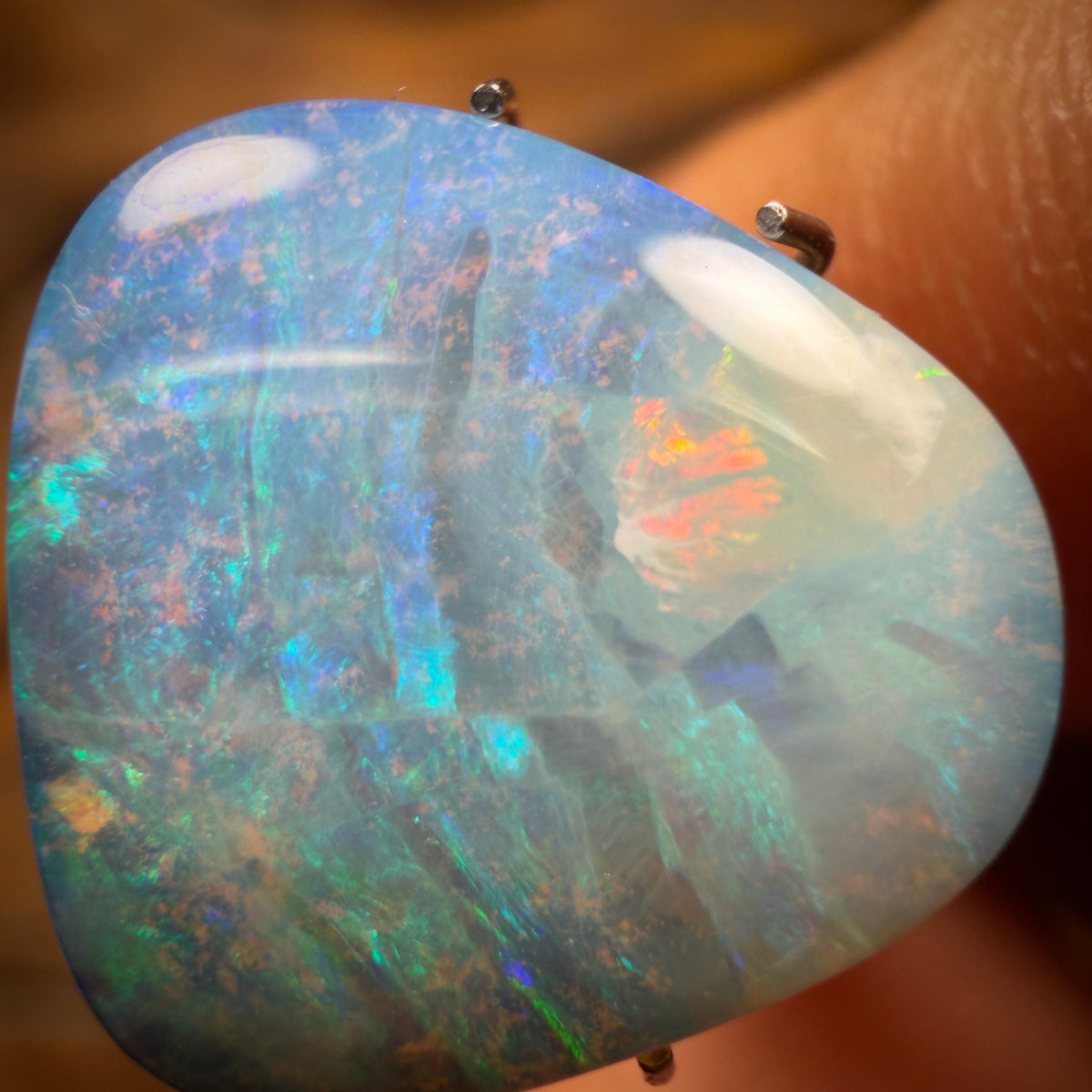 5.5cts - “Sun on the Water” Queensland Boulder Seam Opal. Australian Opal