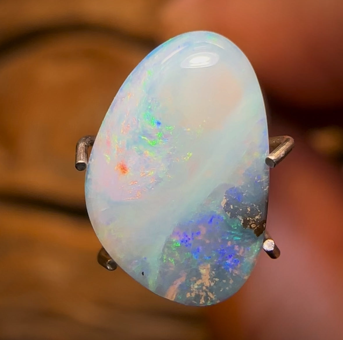 1.7cts - “Passing through the clouds” Queensland Boulder Seam Opal