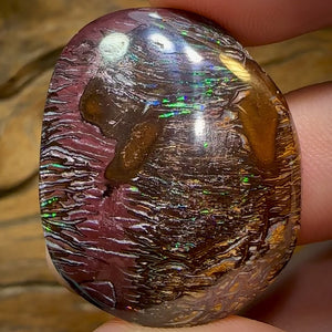 86.9cts - Australian Boulder Opal. Black Tribal Pattern