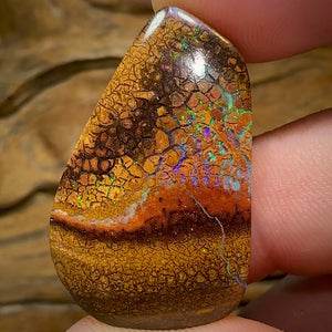 44.1cts - Australian Boulder Opal. Tan tribal landscape