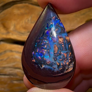 50.6cts - “Deep Blue Tribal”Koroit Nut Kernel Opal