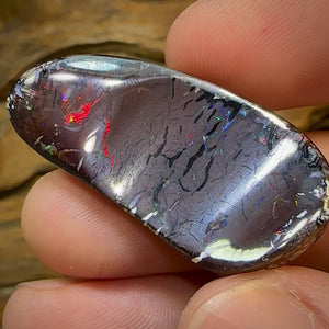 62.6cts - Australian Boulder Opal. Black Tribal Pattern red lightning