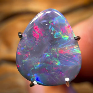 30% Off Card! 1.2cts - Black Opal from Lightning Ridge. RED ON BLACK