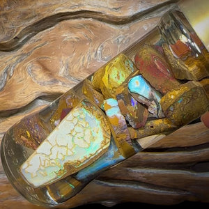 398cts - Jar of Boulder Opal Rubs.